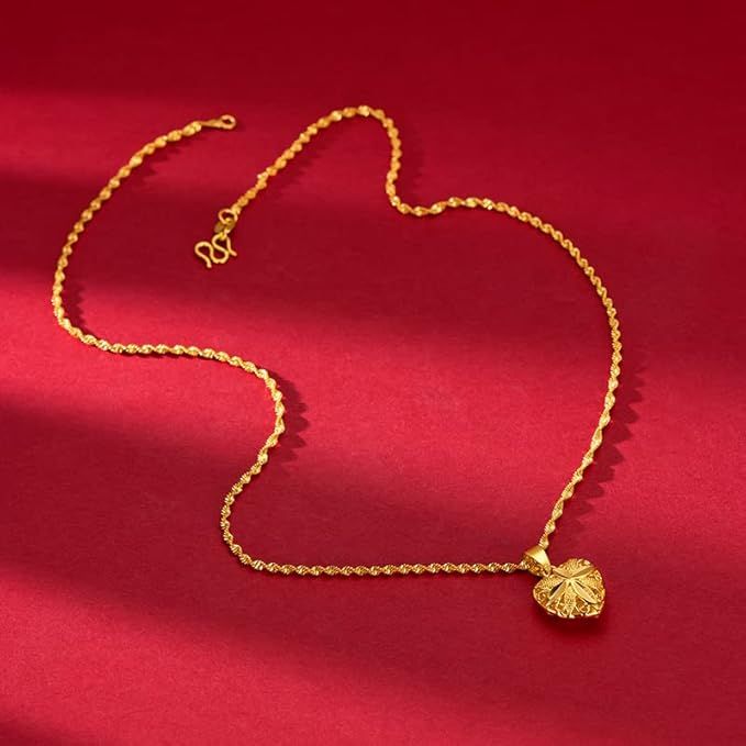 Gold Aura Heart Necklace / قلادة القلب الذهبية